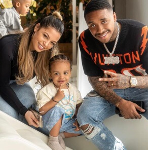 Steven Bergwijn with his girlfriend and son.